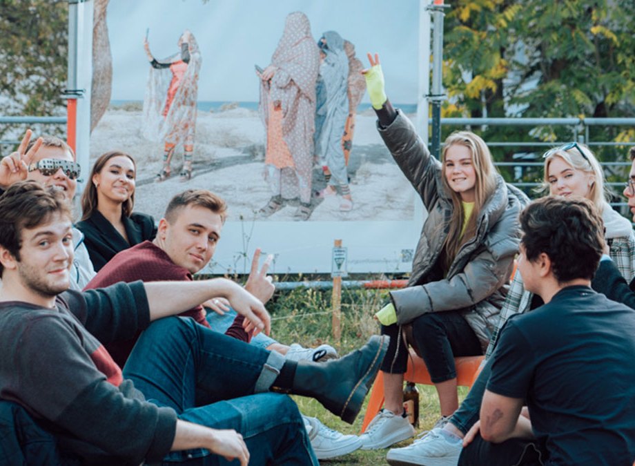 Students enjoying together on terrace