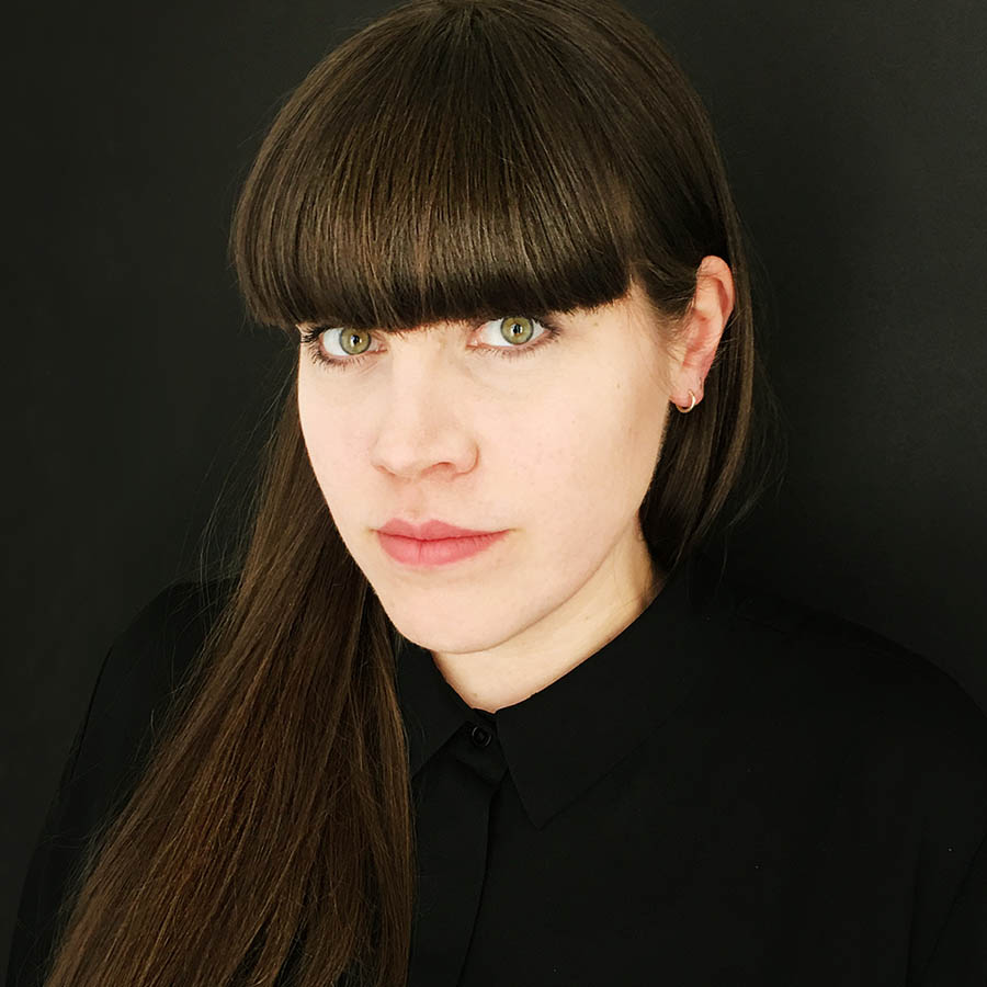 a portrait images of a female person with black background